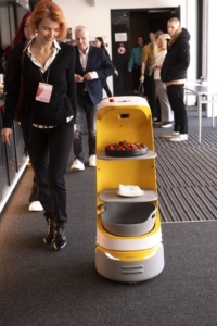 KettyBot service robot at the Äripäev conference BellaBot service robot welcoming guests at an Äripäev business conference